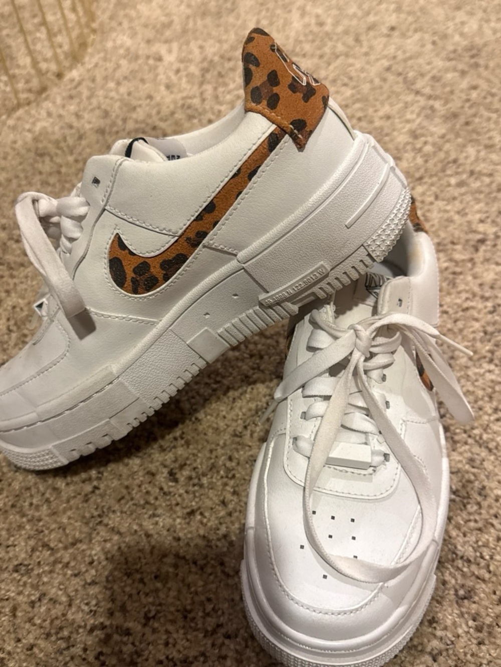 Nike Women’s White Sneakers with Leopard Swoosh